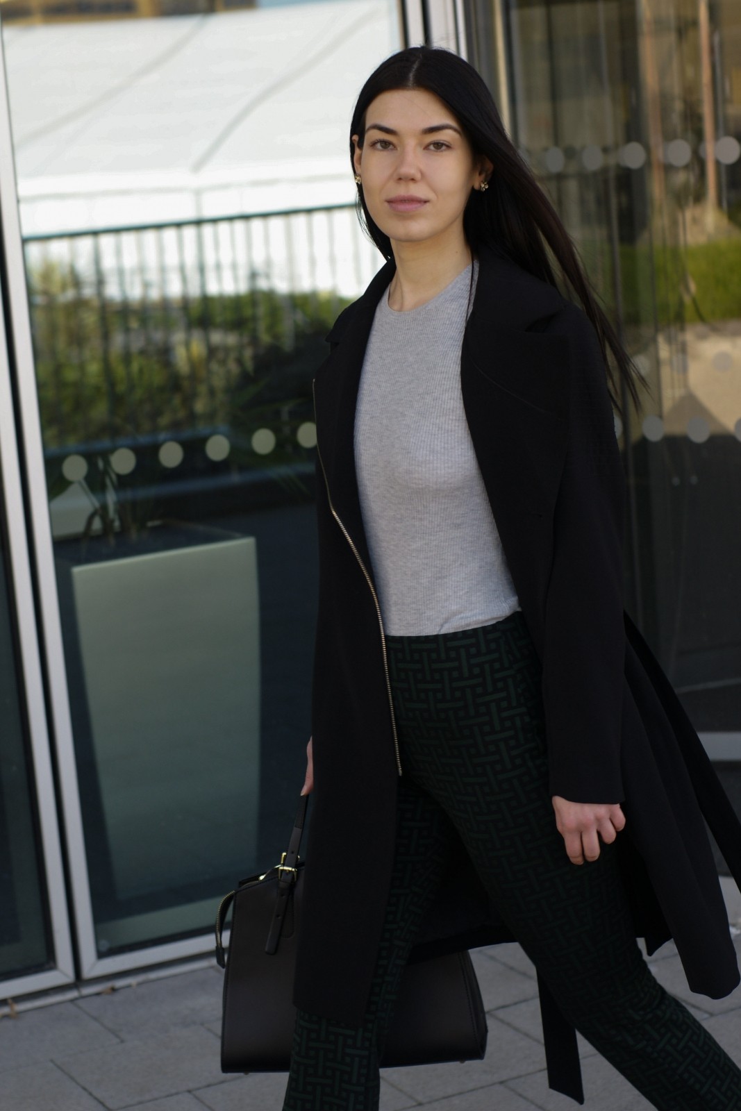 Brunette Fashion Blogger Wearing Black Trench Coat and Grey Jumper