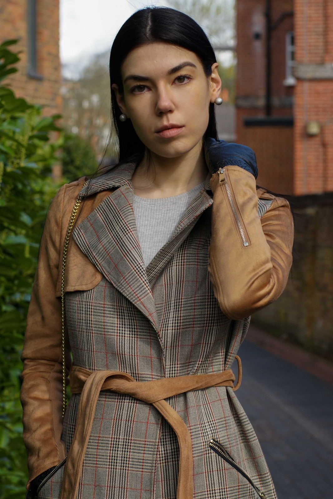 Brunette girl wearing suedette trench coat