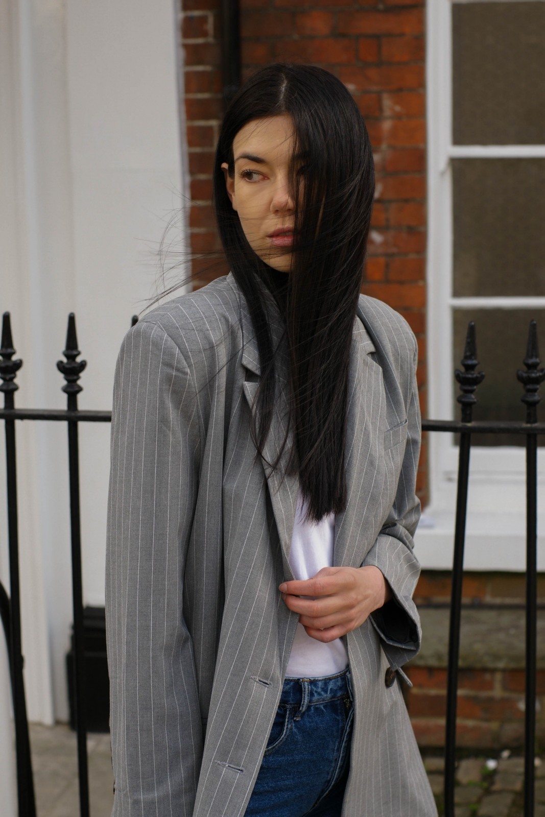 Brunette girl with blowing wind in her hair