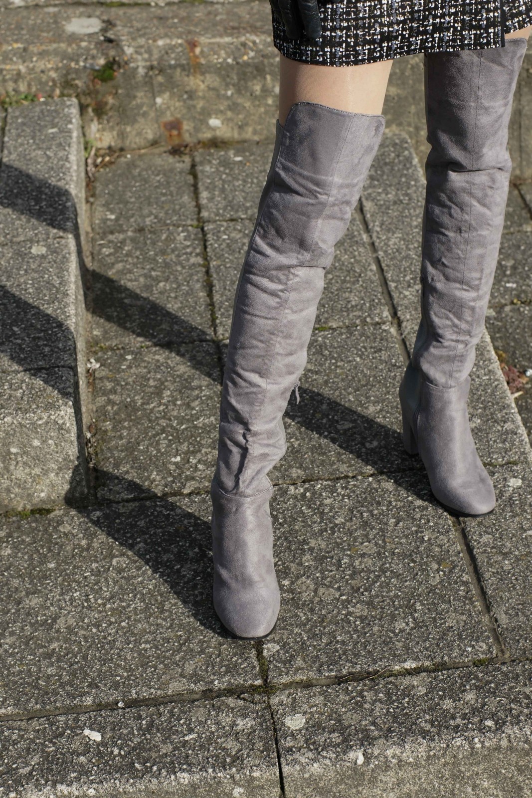 Fashion blogger wearing Ego over-the-knee boots