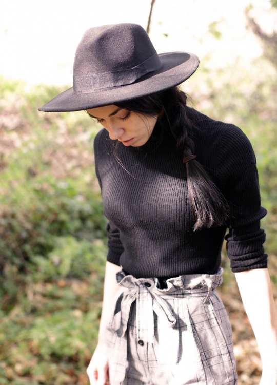 Brunette on Demand Wearing High Waisted Cigarette Trousers With Style