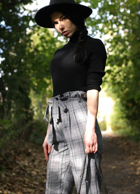 Brunette on Demand Wearing High Waisted Cigarette Trousers With Style